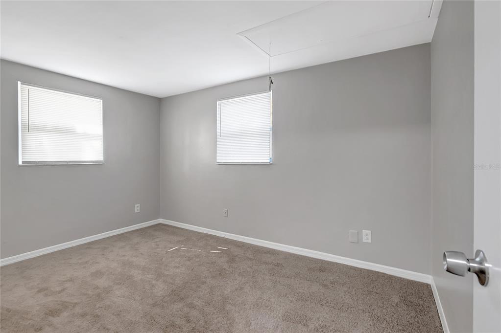 5605 Oceanic Road Holiday, FL 34690 - Photo 19 of 36 an empty room with a window