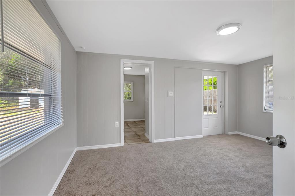 5605 Oceanic Road Holiday, FL 34690 - Photo 27 of 36 an empty room with windows and closet