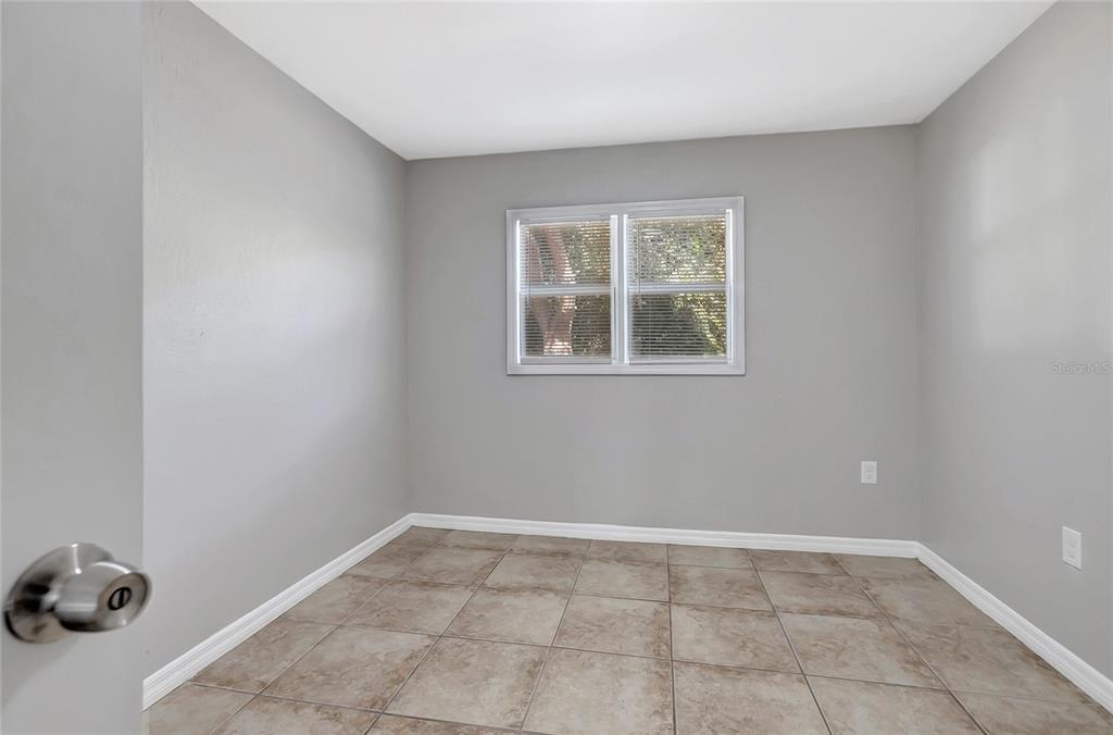 5605 Oceanic Road Holiday, FL 34690 - Photo 30 of 36 a view of an empty room with a window