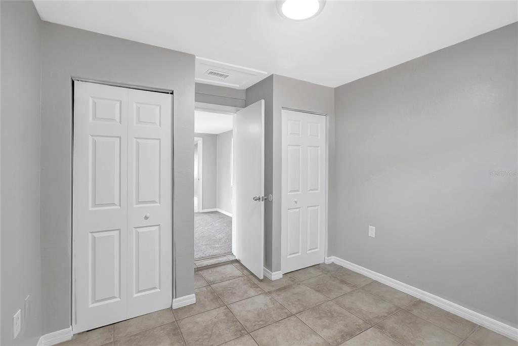 5605 Oceanic Road Holiday, FL 34690 - Photo 31 of 36 an empty room with closet area