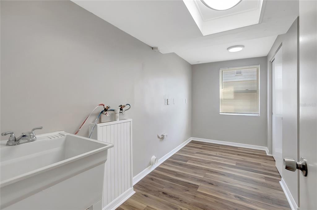 5605 Oceanic Road Holiday, FL 34690 - Photo 32 of 36 a bathroom with a sink and a mirror
