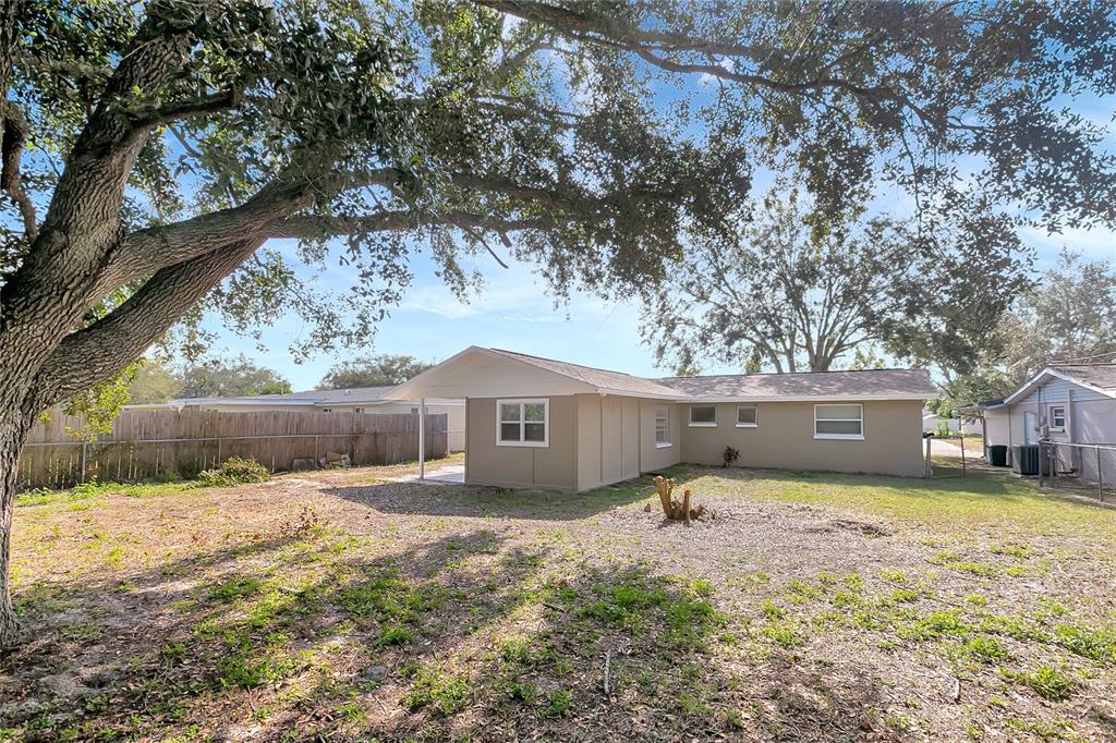 5605 Oceanic Road Holiday, FL 34690 - Photo 35 of 36 a swimming pool view with a seating space