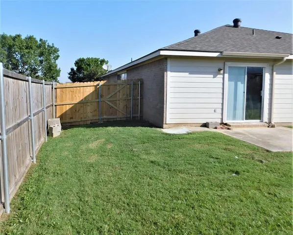 a front view of a house with garage