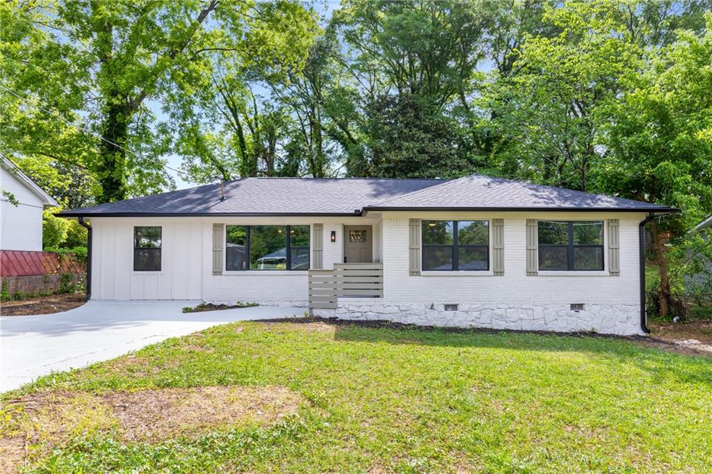 2026 Rebecca Lane Decatur, GA 30032 - Photo 1 of 1 a view of house with a garden and swimming pool