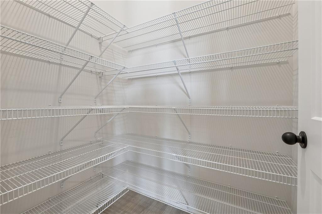 428 Mezzo Lane Alpharetta, GA 30009 - Photo 13 of 30 a view of a room with racks on the wall