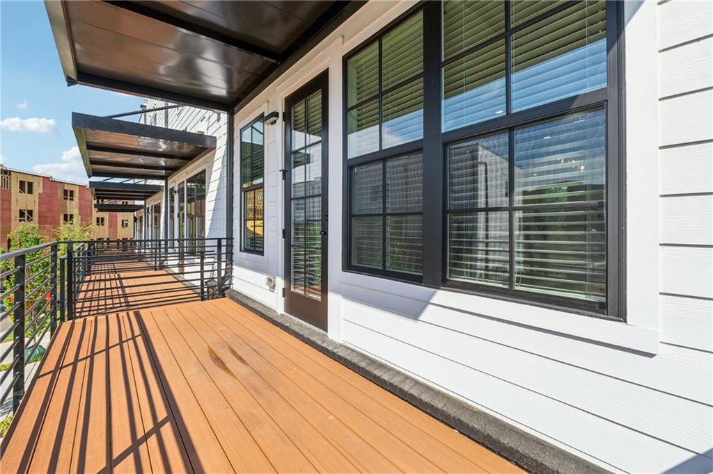 428 Mezzo Lane Alpharetta, GA 30009 - Photo 26 of 30 a view of backyard with a wooden deck