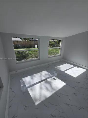 an empty room with a window