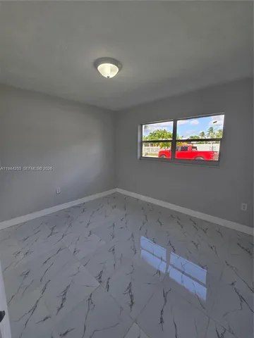 a stove top oven sitting inside of a kitchen