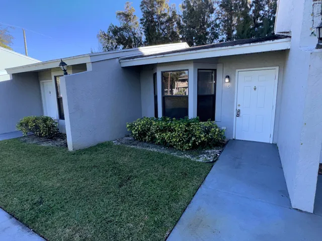 a view of a back yard of the house