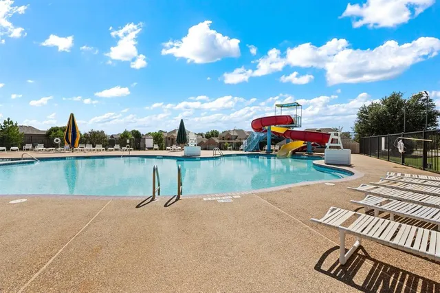 a view of swimming pool from a lake