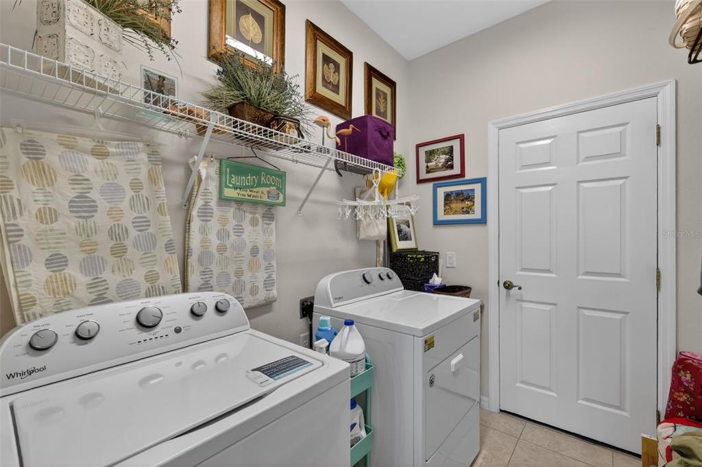 16288 Southwest 14th Avenue Road Ocala, FL 34473 - Photo 24 of 30 a utility room with dryer and washer