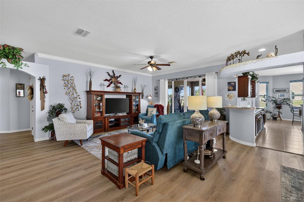 16288 Southwest 14th Avenue Road Ocala, FL 34473 - Photo 6 of 30 a living room with furniture and a fireplace