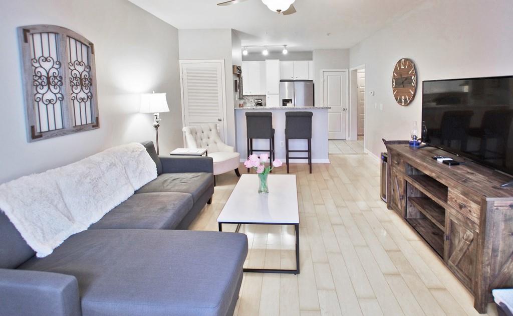 821 Ralph McGill Boulevard Northeast, Unit 3237 Atlanta, GA 30306 - Photo 1 of 1 a living room with furniture and a flat screen tv