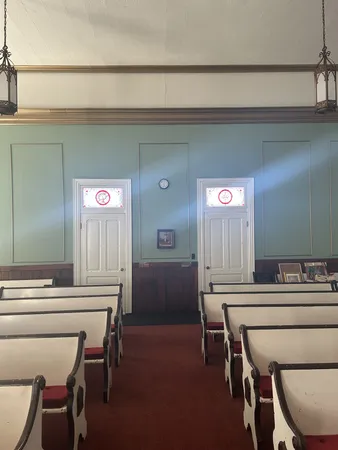 a room with a table and chairs