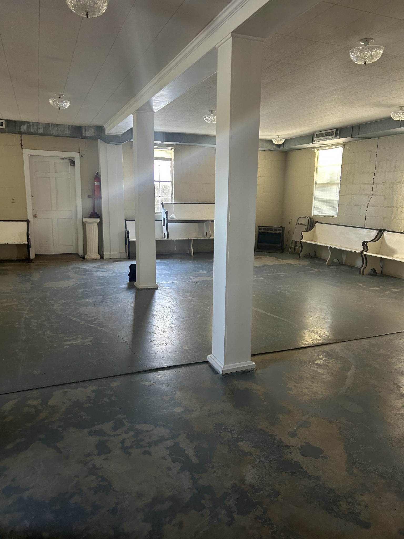 2720 Fly Road Santa Fe, TN 38482 - Photo 10 of 16 an empty room with a bathroom and windows