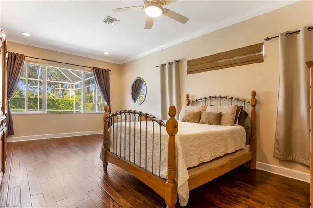 317 Steerforth Court Naples, FL 34110 - Photo 14 of 31 a bedroom with a bed and window