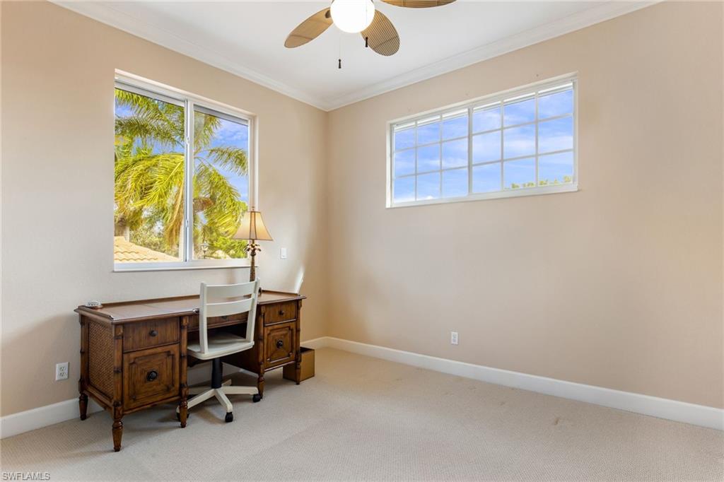 317 Steerforth Court Naples, FL 34110 - Photo 27 of 31 an empty room with a workspace