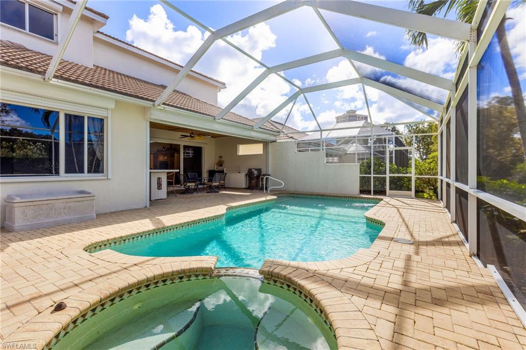 317 Steerforth Court Naples, FL 34110 - Photo 31 of 31 a view of a house with backyard porch and sitting area