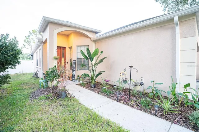 a view of a garden with a outdoor space