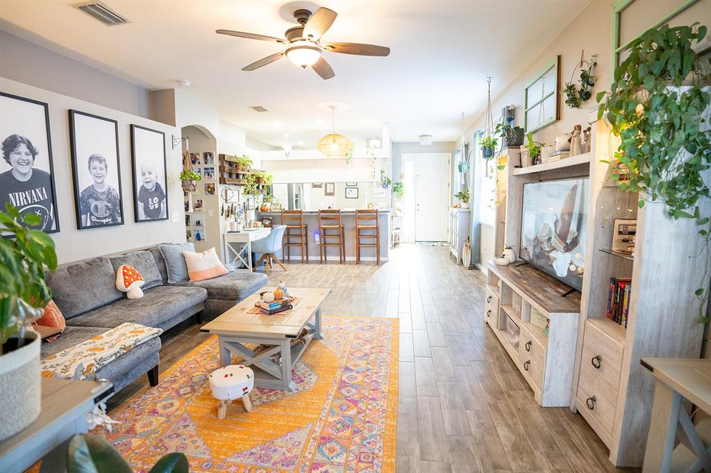 6207 Kiteridge Drive Lithia, FL 33547 - Photo 5 of 39 a living room with furniture and a wooden floor