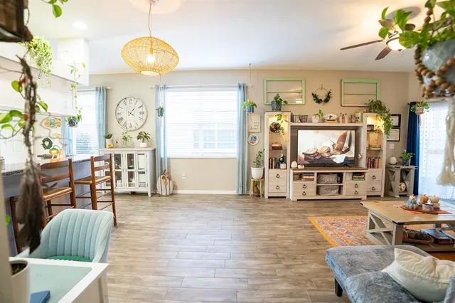 a stove top oven sitting inside of a kitchen