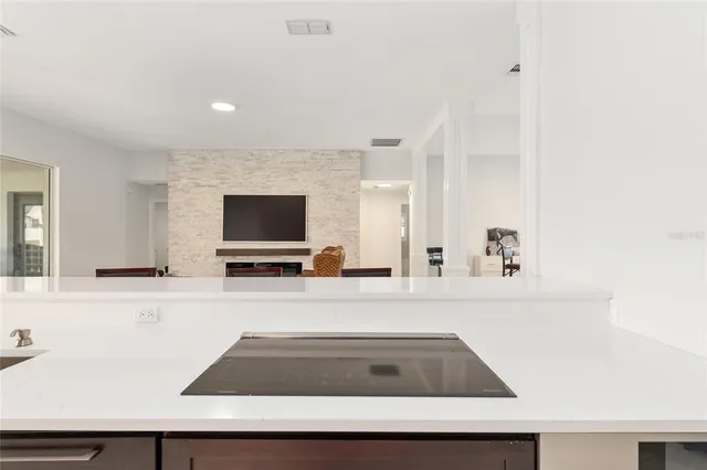 a bedroom with a bed chair and a window