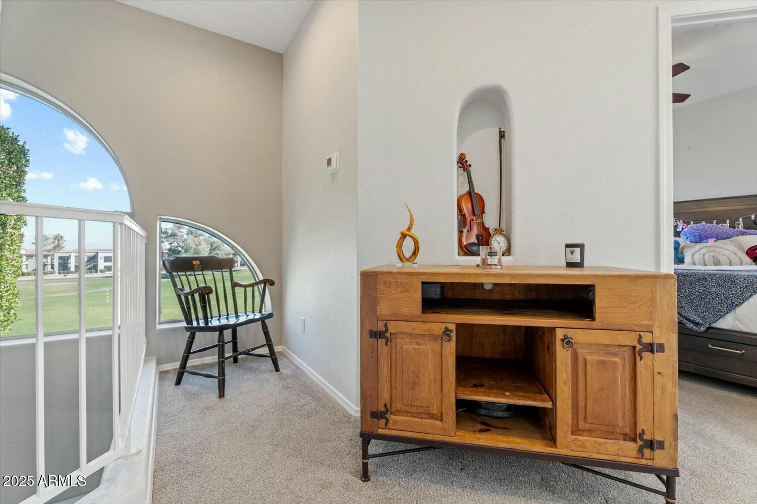 8813 South 51st Street, Unit 3 Phoenix, AZ 85044 - Photo 15 of 28 a living room with furniture and a window