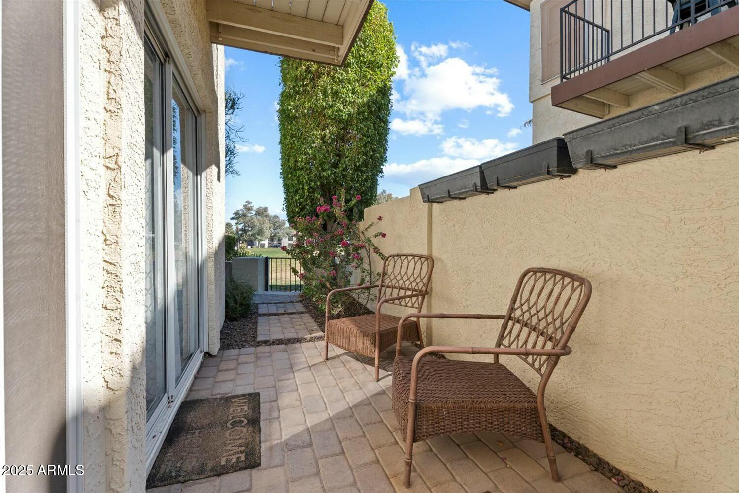 8813 South 51st Street, Unit 3 Phoenix, AZ 85044 - Photo 4 of 28 a view of two chairs in the balcony