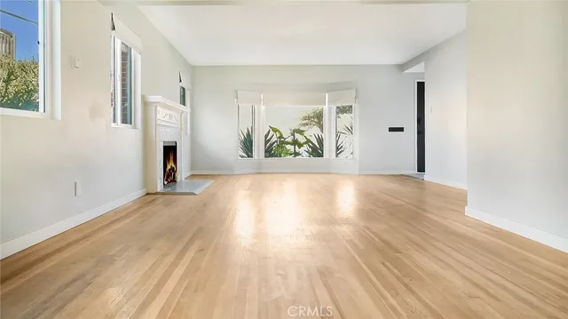 a view of an empty room and window