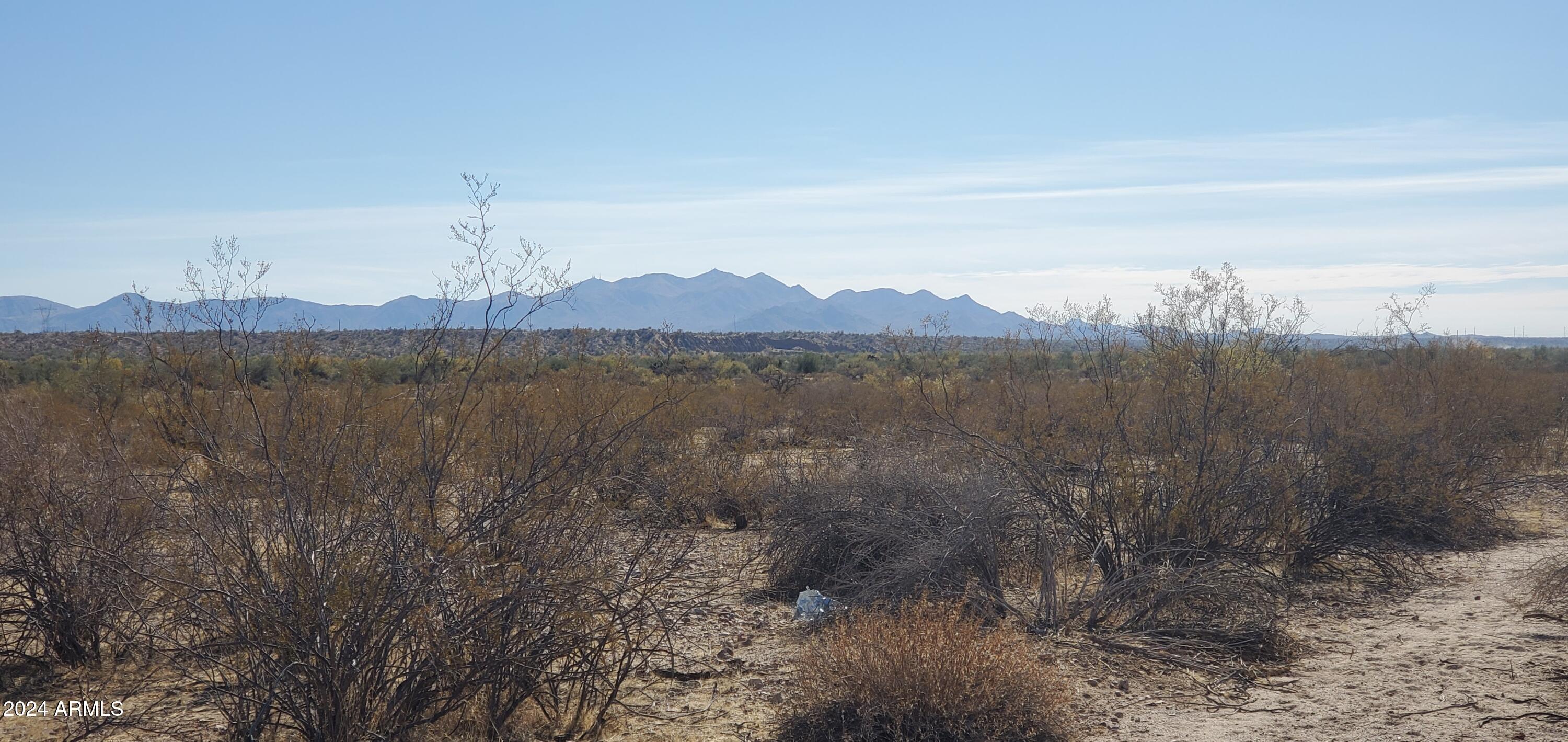 29150 West Radford Road, Unit 82 Wittmann, AZ 85361 - Photo 3 of 6 a view of lake with mountain