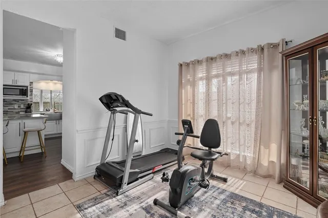 a view of a room with gym equipment