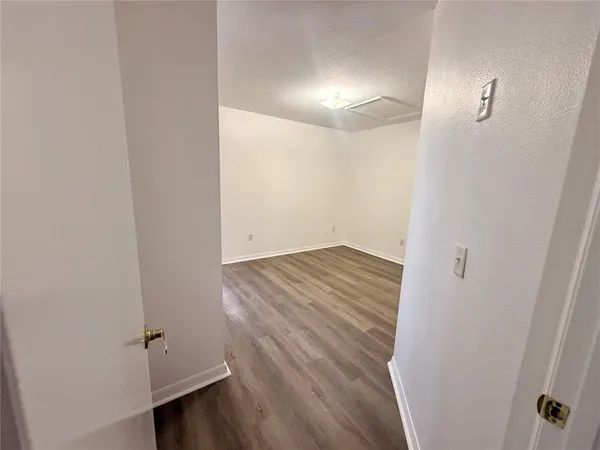 a view of a bathroom from a hallway