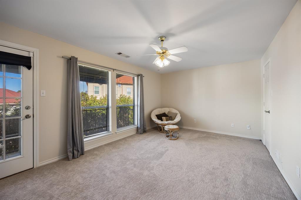 3002 Preston Court Rockwall, TX 75087 - Photo 21 of 39 an empty room with windows and ceiling fan