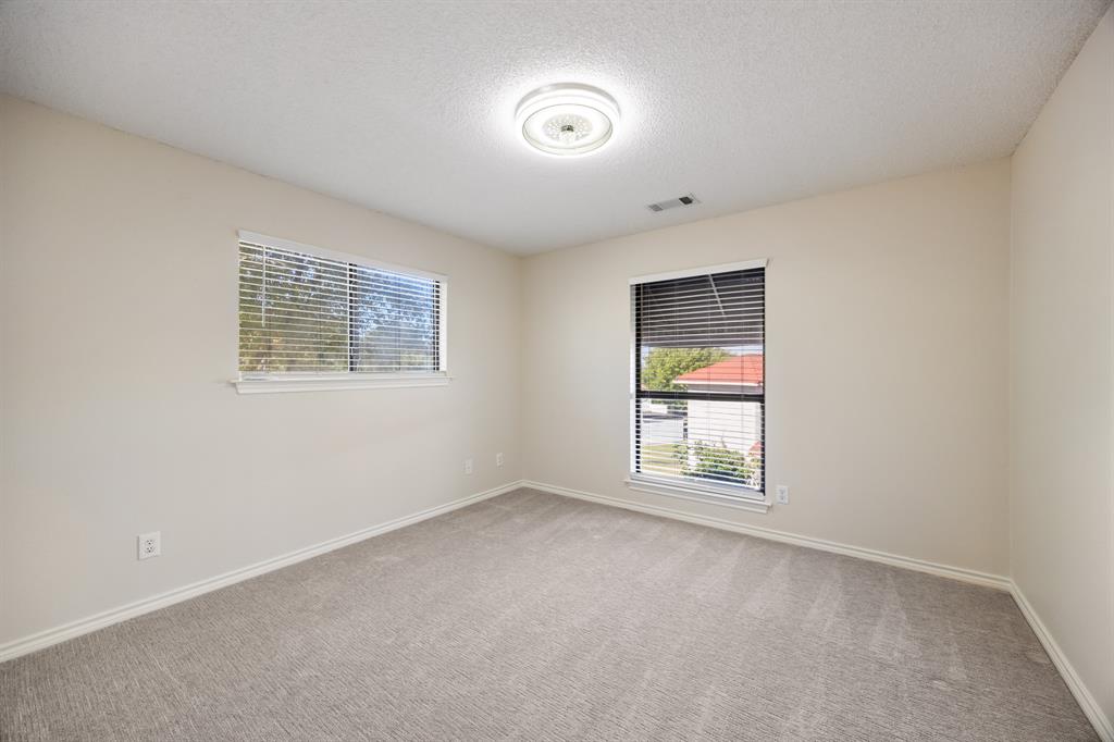 3002 Preston Court Rockwall, TX 75087 - Photo 25 of 39 a view of an empty room with a window