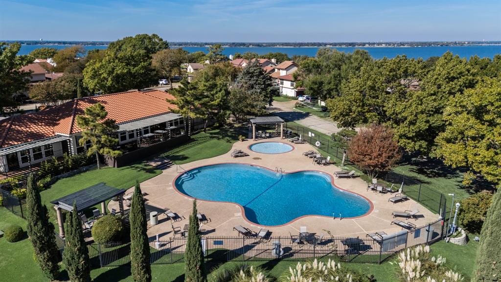 3002 Preston Court Rockwall, TX 75087 - Photo 36 of 39 an aerial view of a house with garden space and outdoor seating
