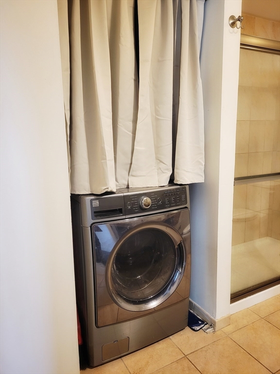 1029 Pleasant Street, Unit 20 Worcester, MA 01602 - Photo 9 of 16 a close up view of a washer and dryer