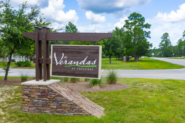 a view of a park with welcome board