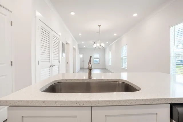 a view of a hallway with staircase