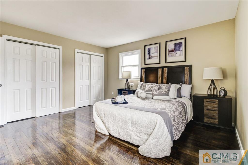 40 Foley Avenue Edison, NJ 08820 - Photo 14 of 19 a bed room with a bed and a night stand