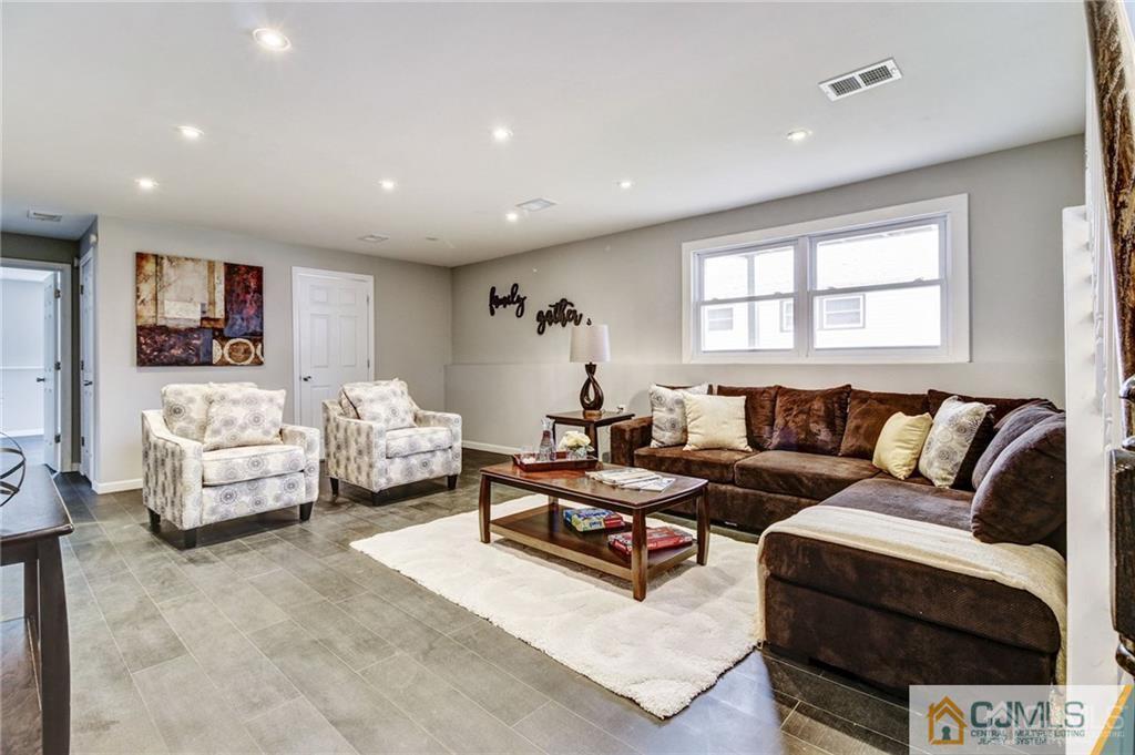 40 Foley Avenue Edison, NJ 08820 - Photo 18 of 19 a living room with furniture