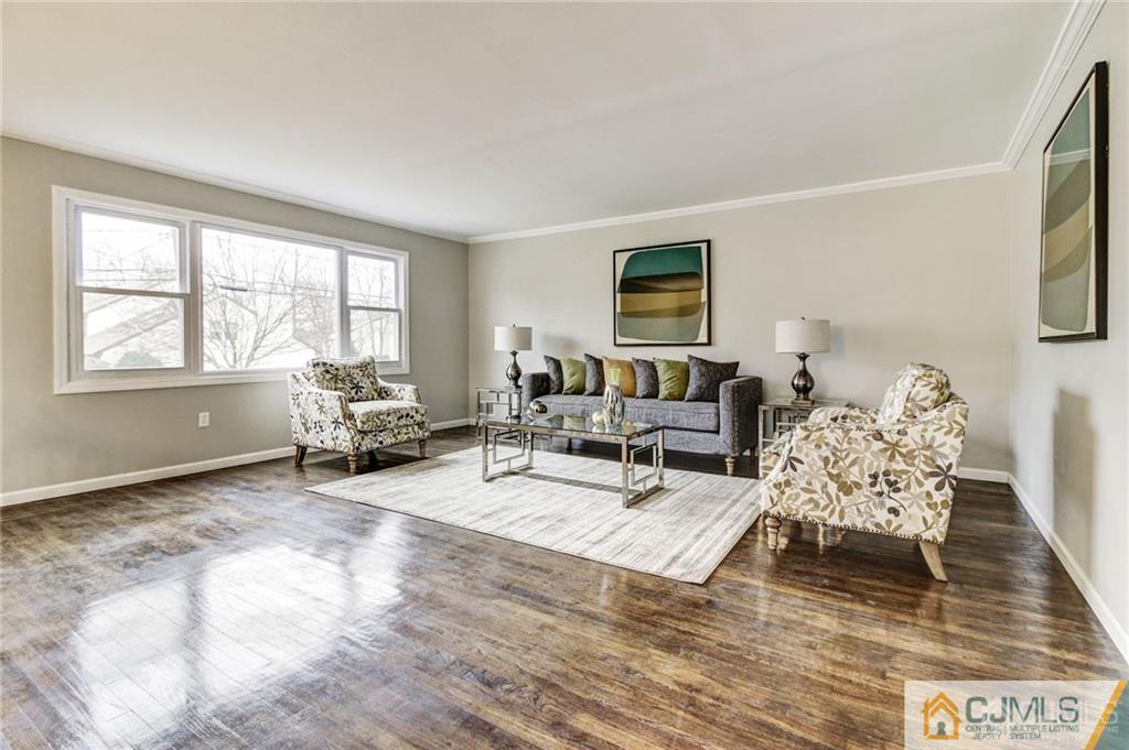 40 Foley Avenue Edison, NJ 08820 - Photo 3 of 19 a living room with furniture window and a flat screen tv