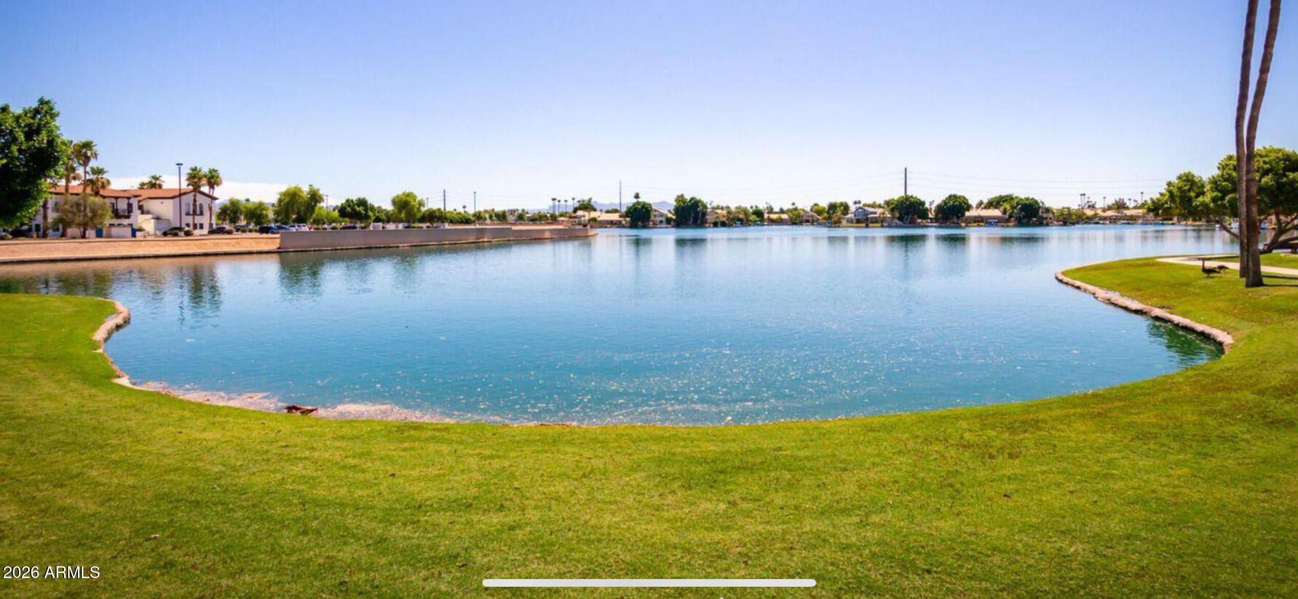 2301 East Santa Rosa Drive Gilbert, AZ 85234 - Photo 40 of 54 grass and lake