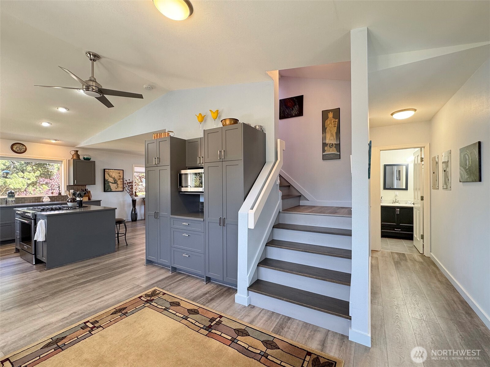 866 Jamestown Road Sequim, WA 98382 - Photo 17 of 40 a view of a living room and entryway with wooden floor