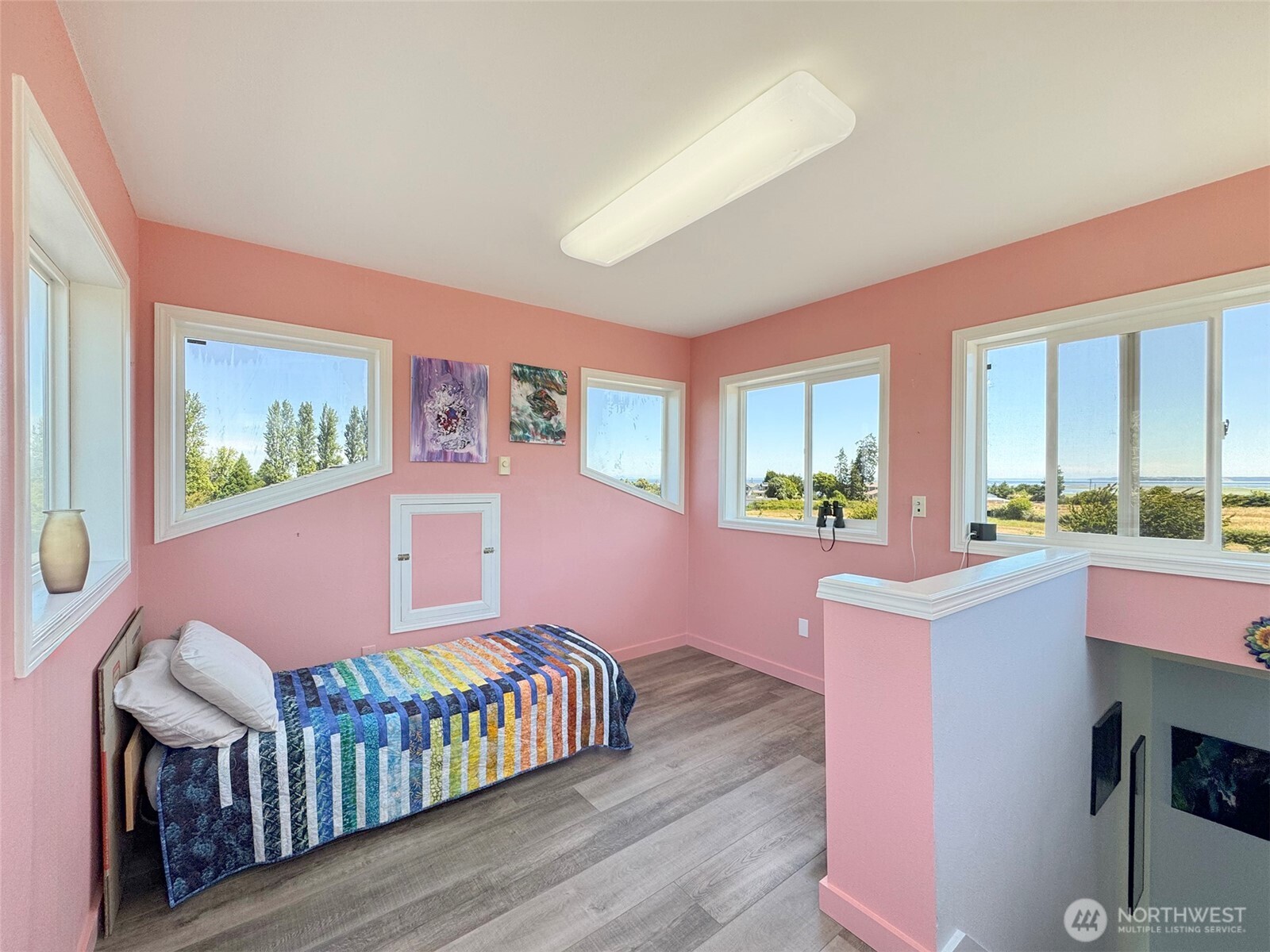 866 Jamestown Road Sequim, WA 98382 - Photo 18 of 40 a bedroom with furniture a rug and a window