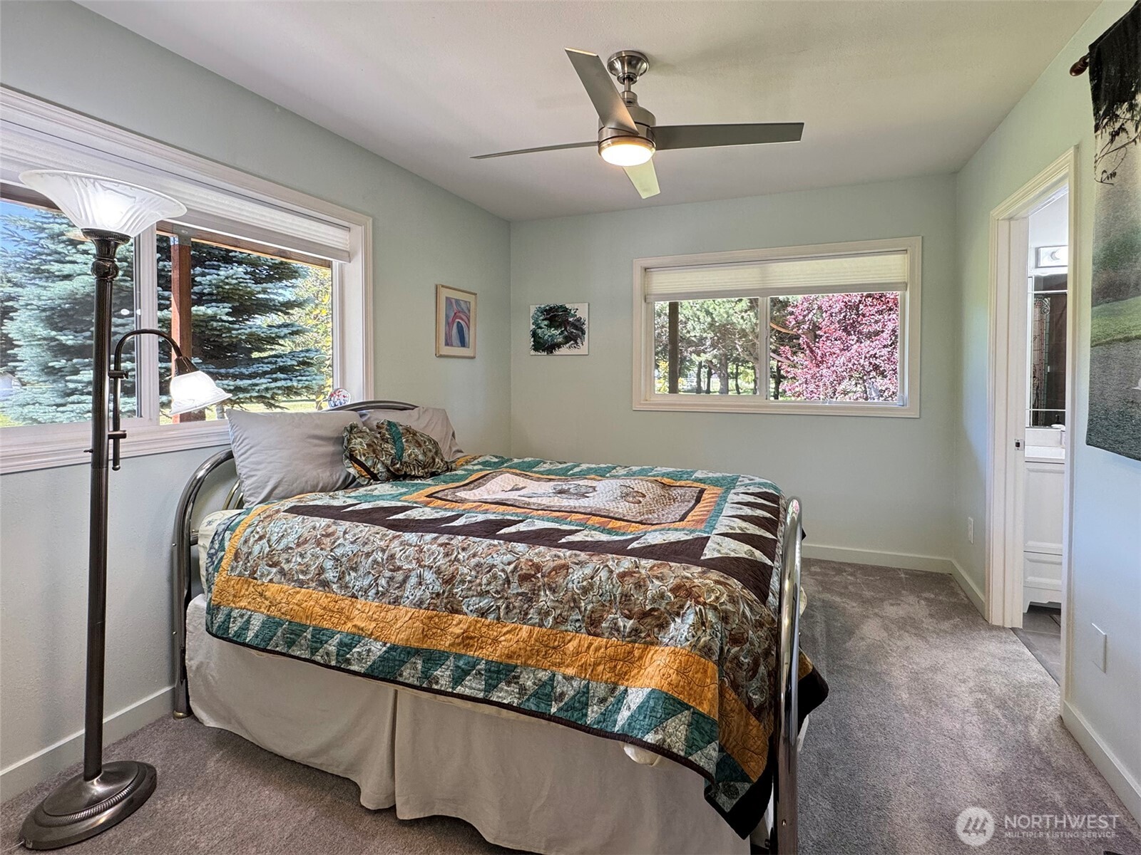 866 Jamestown Road Sequim, WA 98382 - Photo 24 of 40 a bed sitting in a bedroom next to a window
