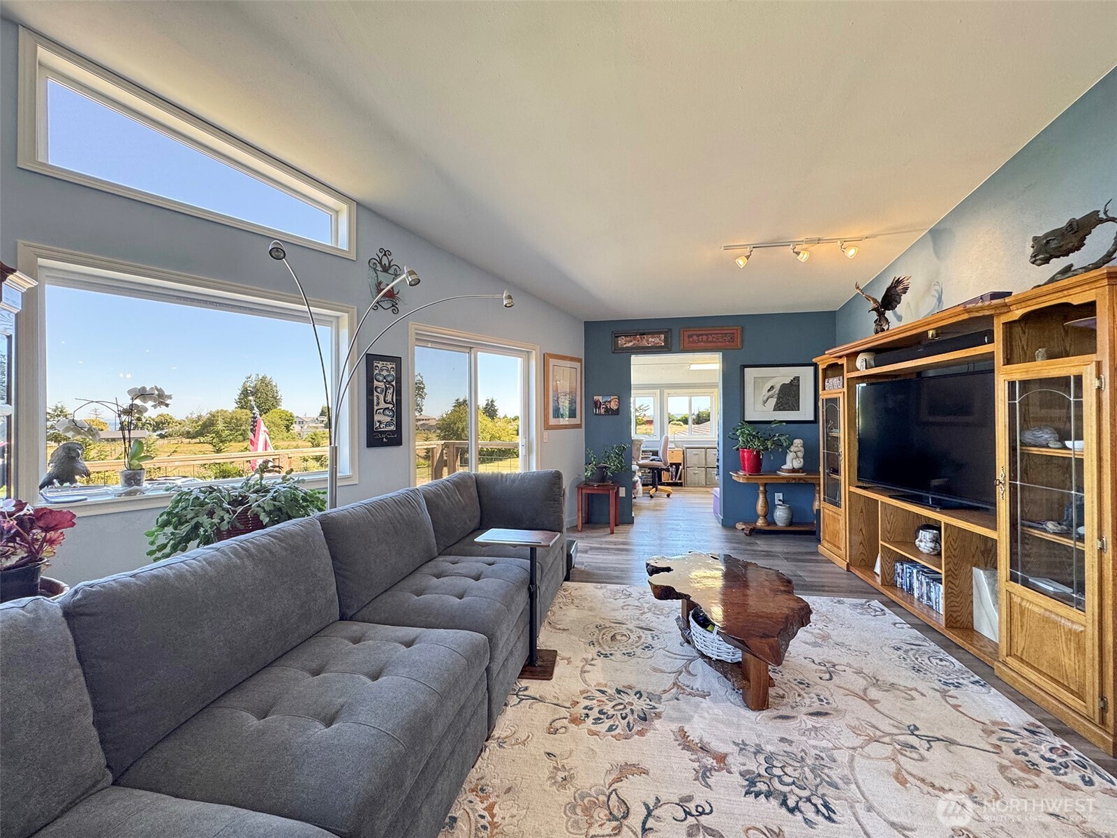 866 Jamestown Road Sequim, WA 98382 - Photo 8 of 40 a living room with furniture and a flat screen tv