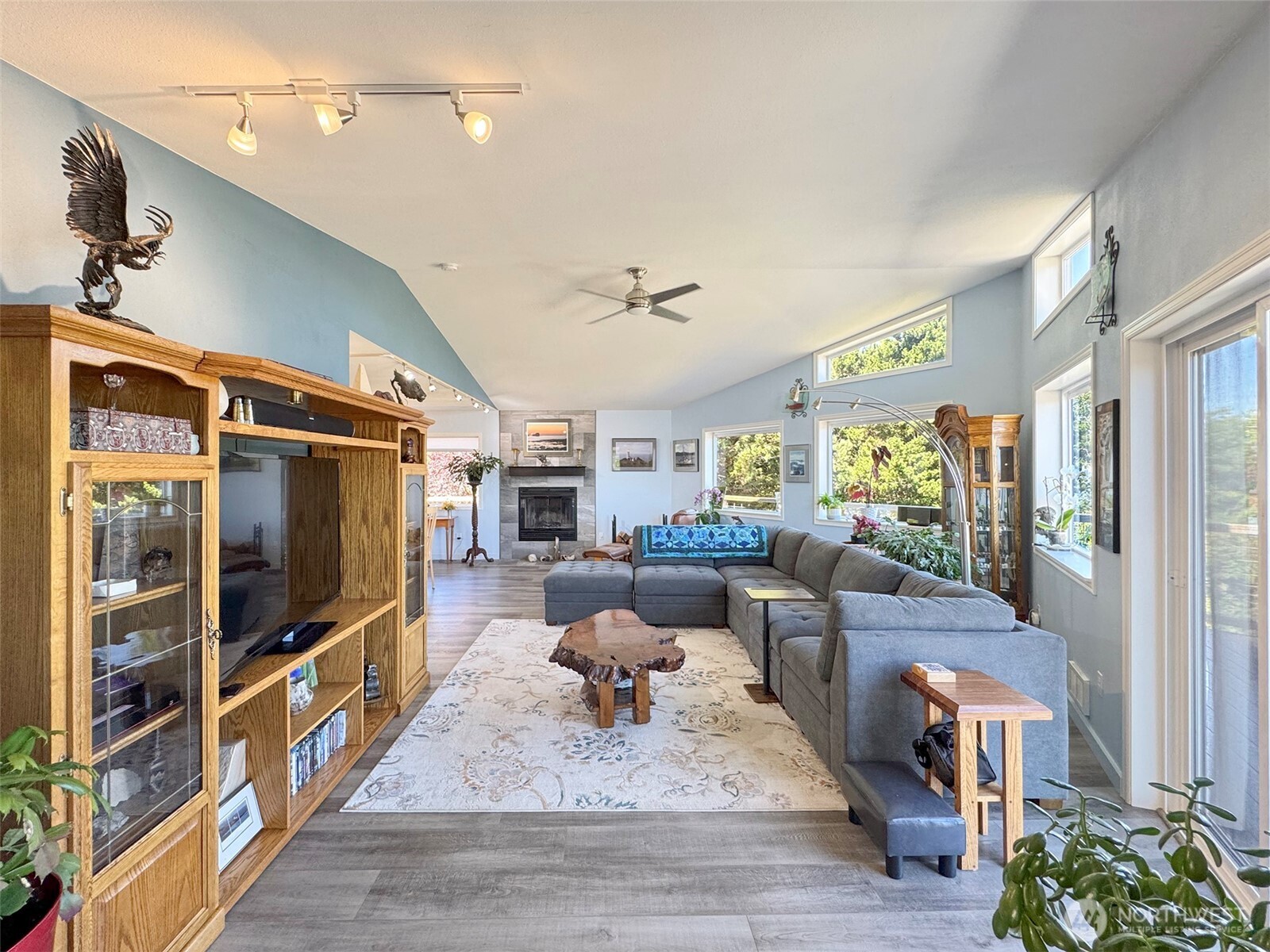 866 Jamestown Road Sequim, WA 98382 - Photo 9 of 40 a living room with furniture and a flat screen tv