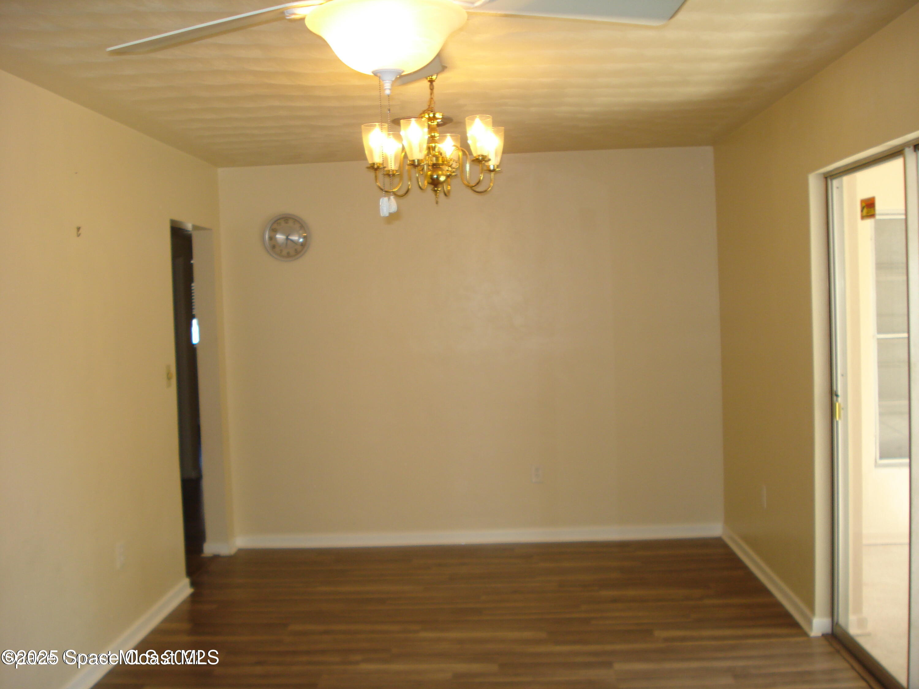 19 Orange Avenue Rockledge, FL 32955 - Photo 7 of 25 a view of a livingroom with wooden floor