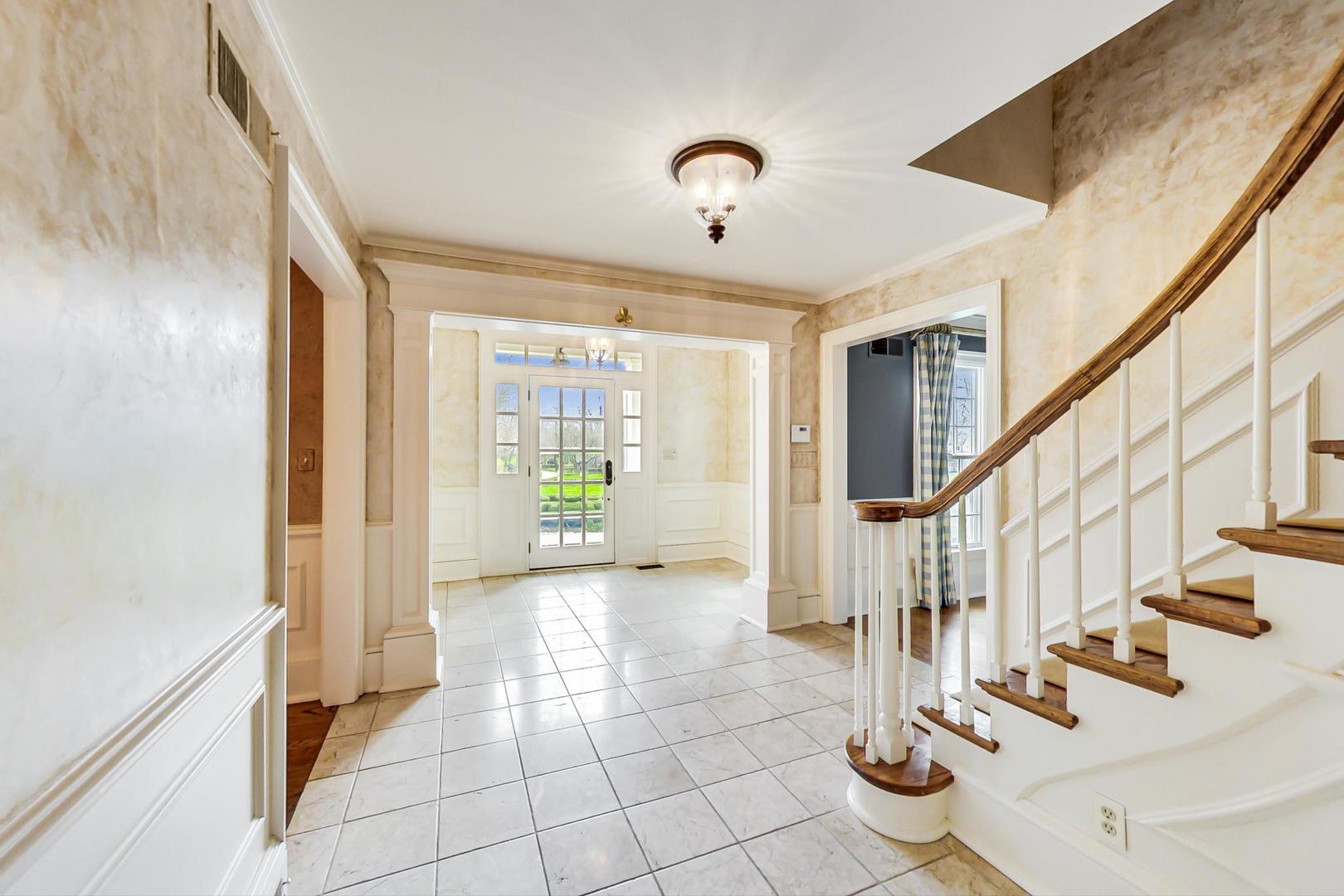 150 Firth Road Inverness, IL 60067 - Photo 11 of 83 a view of entryway and hall with wooden floor