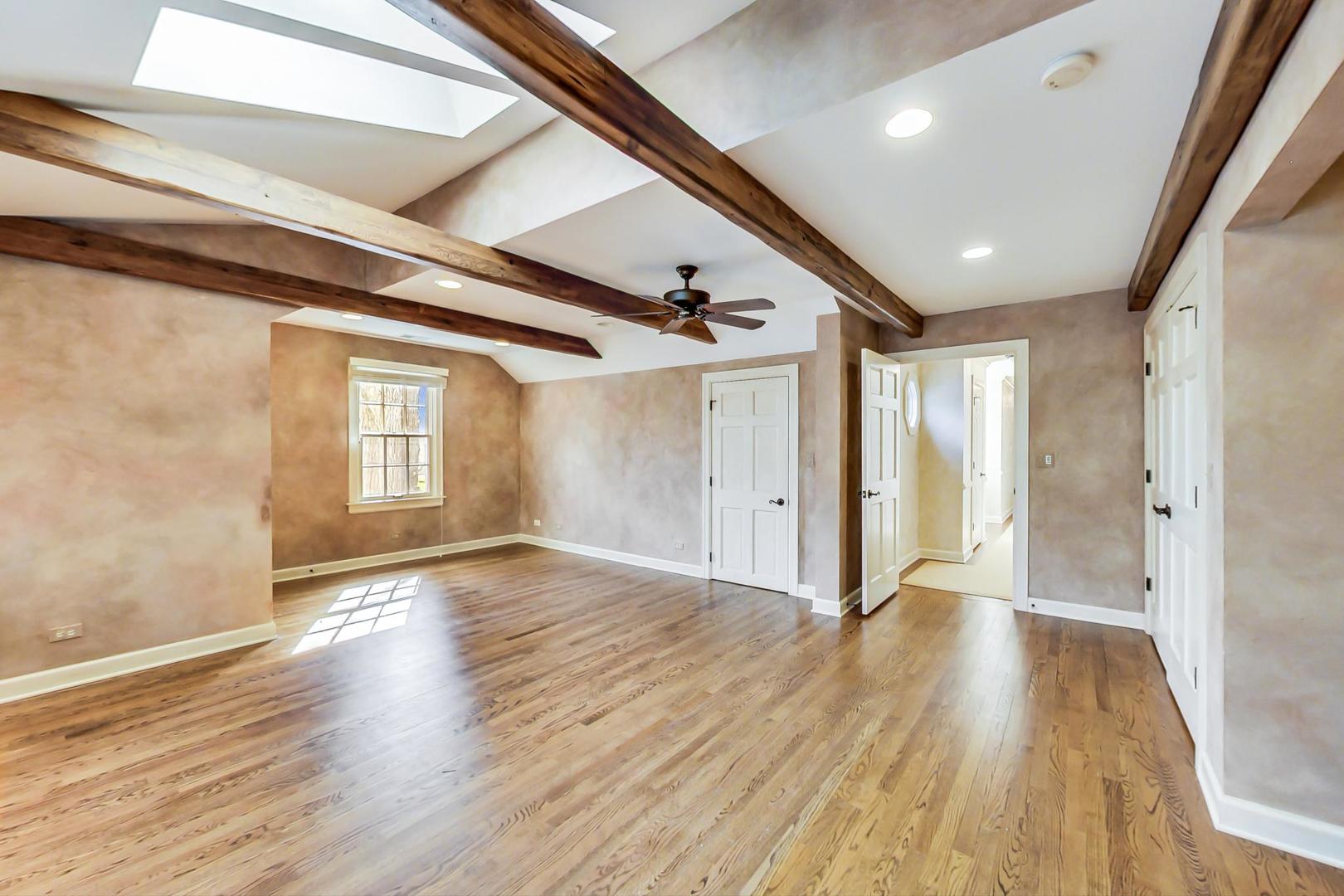 150 Firth Road Inverness, IL 60067 - Photo 47 of 83 a view of an empty room with wooden floor